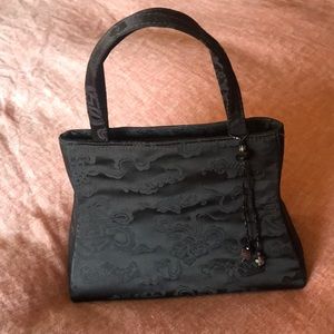 Brown silk purse. Hand made by Elsie Sinclair.